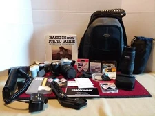 Pentax ZX-L 35mm SLR Film Camera w/manual and lots of lenses and filters