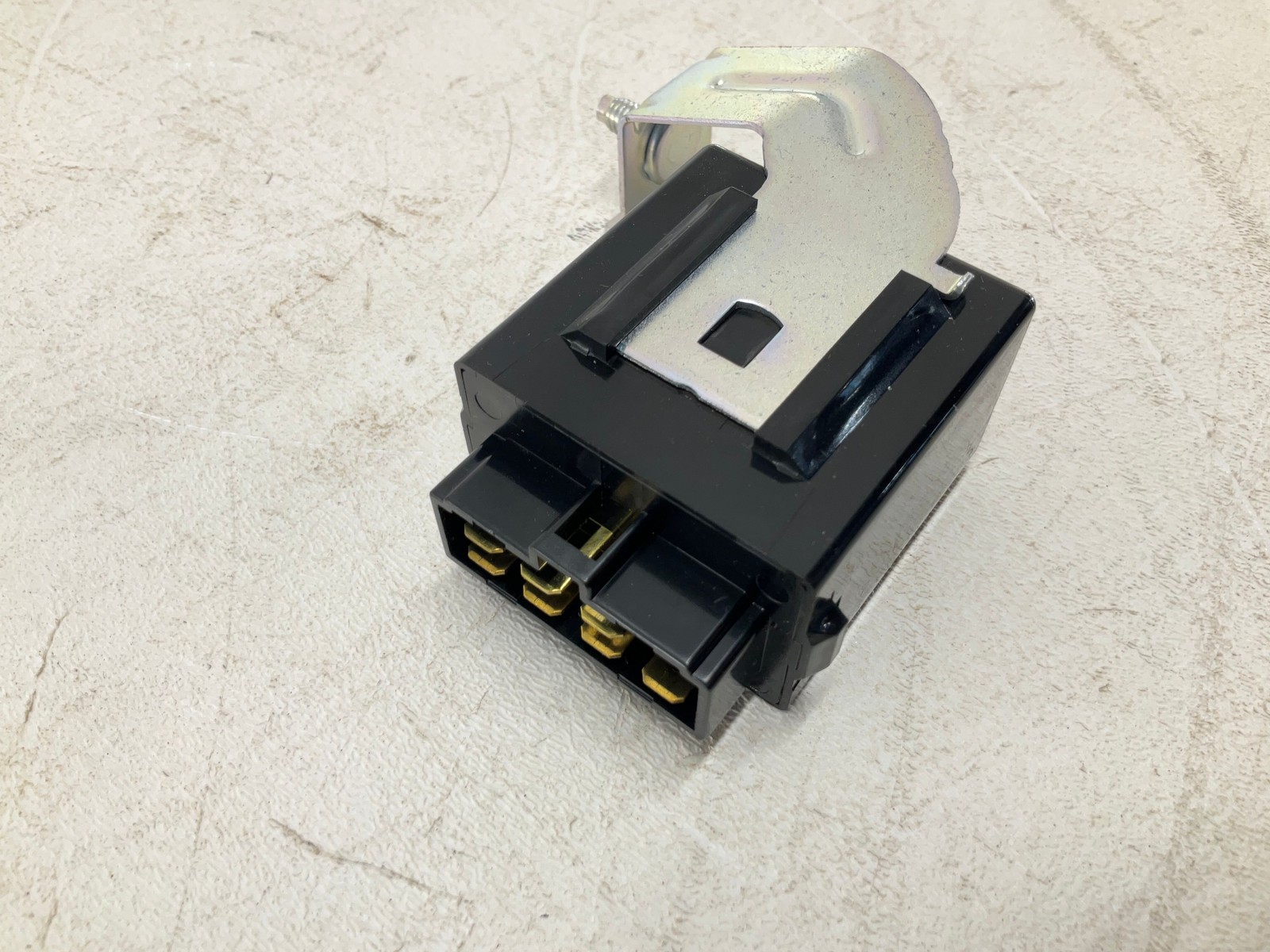 Black 02-07 Subaru Impreza chassis ECM with yellow connector, silver heat sink, and two black wiring harnesses.