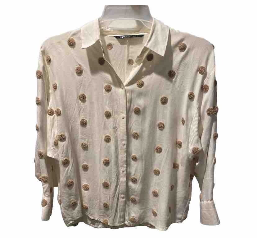 tan polka dot top