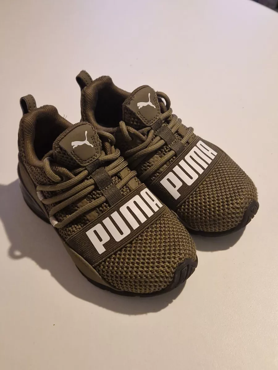 Kids size 10 Puma Trainers pull on elasticated laces green unisex