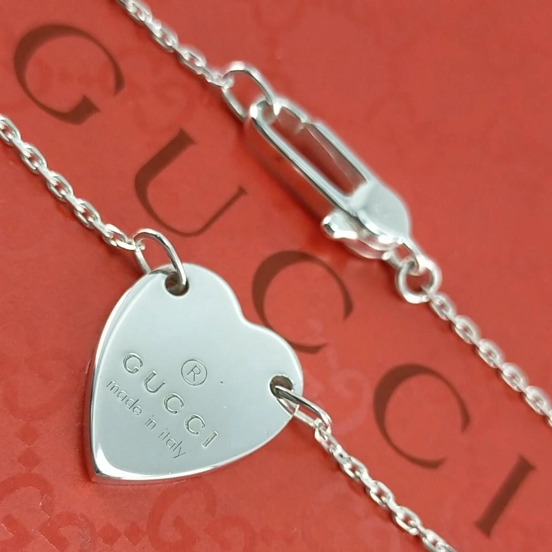 Bracciale Gucci piastra cuore argento sterling SV925 autentico unisex