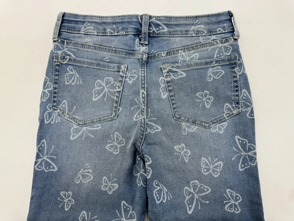 Pantalones de mezclilla Jumping Beans tiro alto acampanados para niñas lavado claro estampado de mariposas talla 10 nuevos sin etiquetas Foto 4 de 4