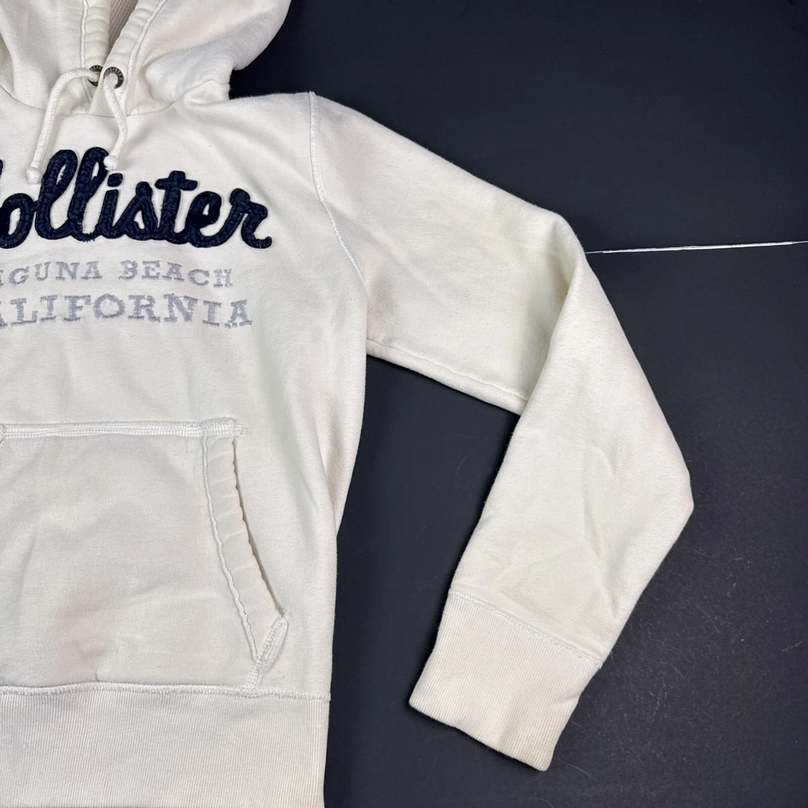 OFF WHITE Felpa con cappuccio HOLLISTER LAGUNA BEACH CALIFORNIA donna taglia XS bianco panna