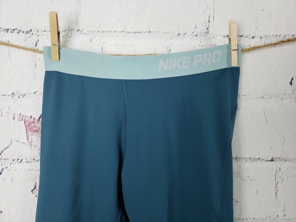 Calça cropped Nike Dri-Fit Pro Athletic Wear ioga fitness tamanho médio azul-petróleo - Imagem 2 de 4