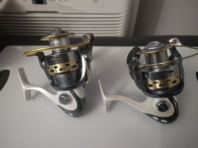 (2) OKUMA V- SYSTEM REELS Model # V-55a / V-55 / CLEAN  / SEE PHOTOS