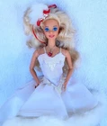 Vintage Barbie TNT doll 1980's Christmas Barbie blonde hair blue eyes mattel