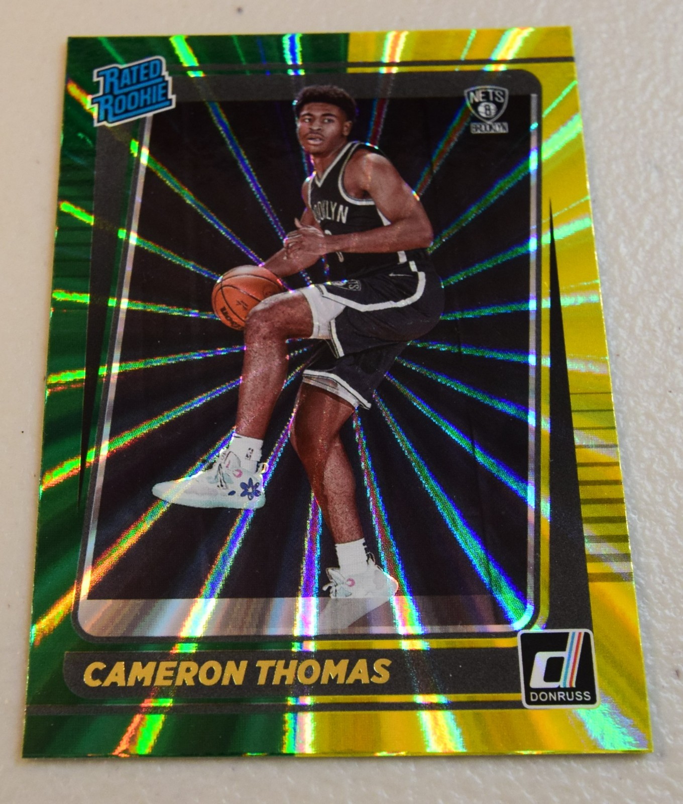2021-22 Donruss Cameron Thomas #203 Rated Rookie Holo Green & Yellow Laser