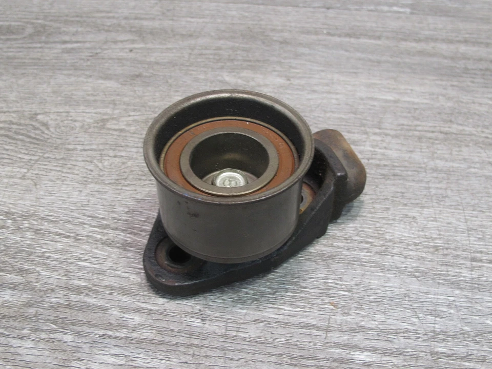 🥇91-99 MITSUBISHI 3000GT ENGINE TIMING BELT TENSIONER PULLEY OEM - Image 4 of 4