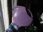 A RETIRED LARGE LILAC HOMER LAUGHLIN FIESTA WARE LARGE DISC PITCHER