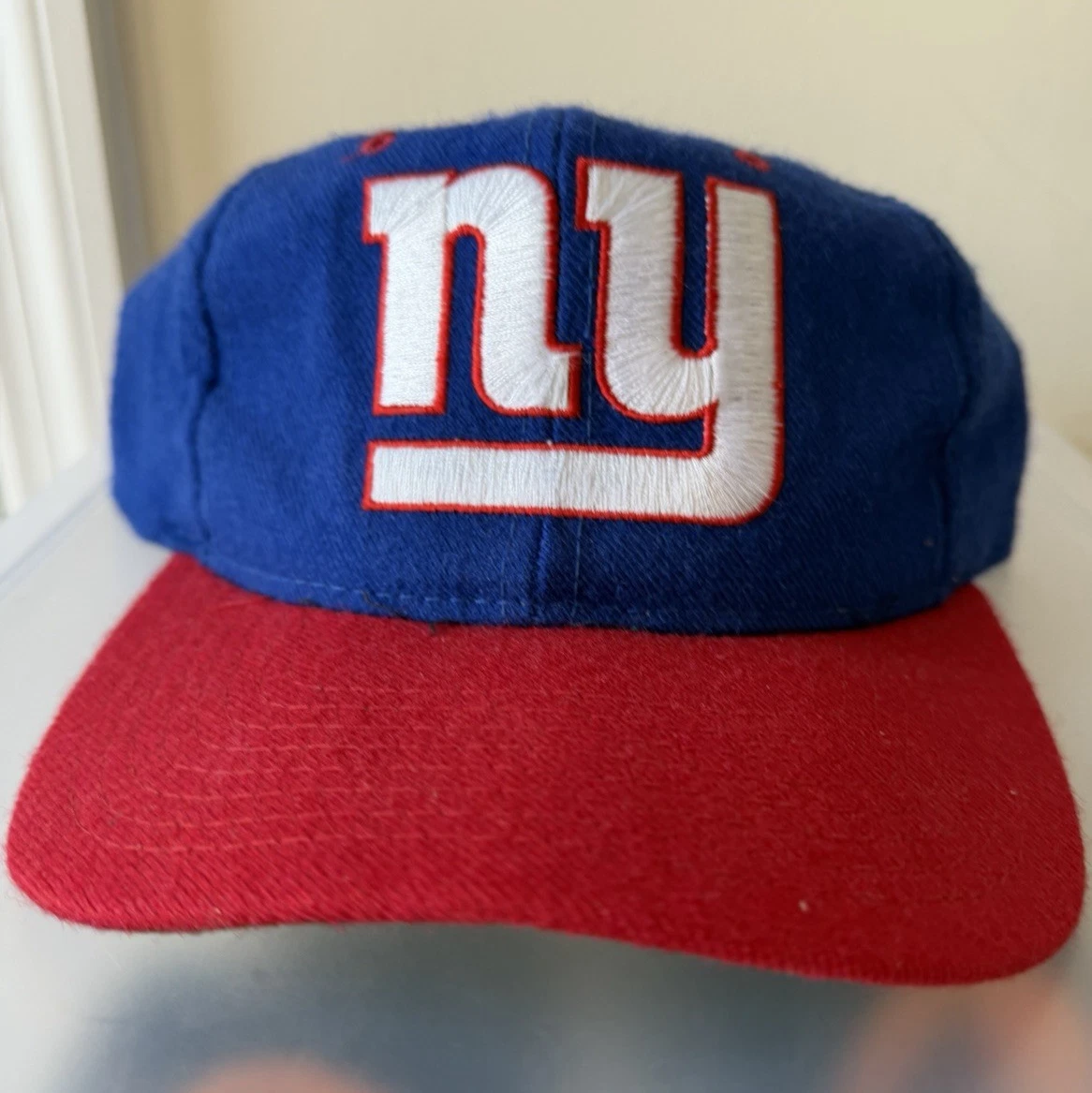 Preços baixos em Starter New York Giants Sports Fan Boné, Chapéus