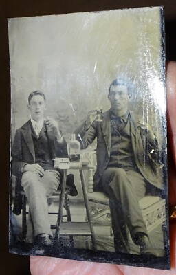 Tintype Photograph of 2 gents with whiskey and cigarettes, circa 1860s or  1870s