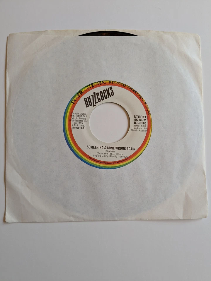 The Buzzcocks I believe 7" vinyl single signed STEVE GARVEY I.R.S. Records 1980 Foto 4 de 4