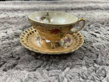 Unbranded 1960 era  Tea Cup with Matching Reticulated Saucer Floral Design