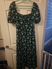 Beautiful holiday /party dress Black with flowers