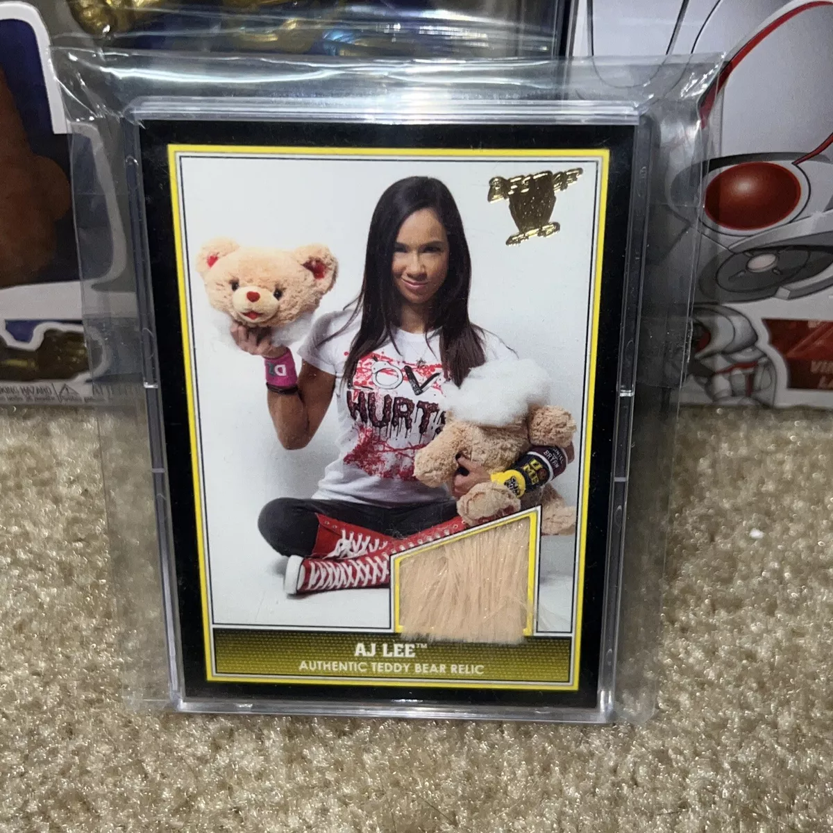 WWE Diva AJ LEE Topps 2013 Best AUTHENTIC Teddy Bear Relic Card SSP Mendez eBay BEST OF 2013 DIVA