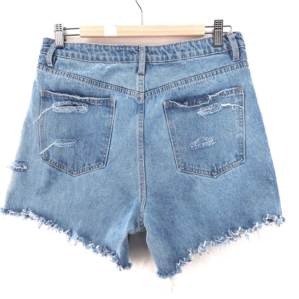 Pantalones cortos de mezclilla de tiro alto desgastados azules para mujer  Foto 2 de 4