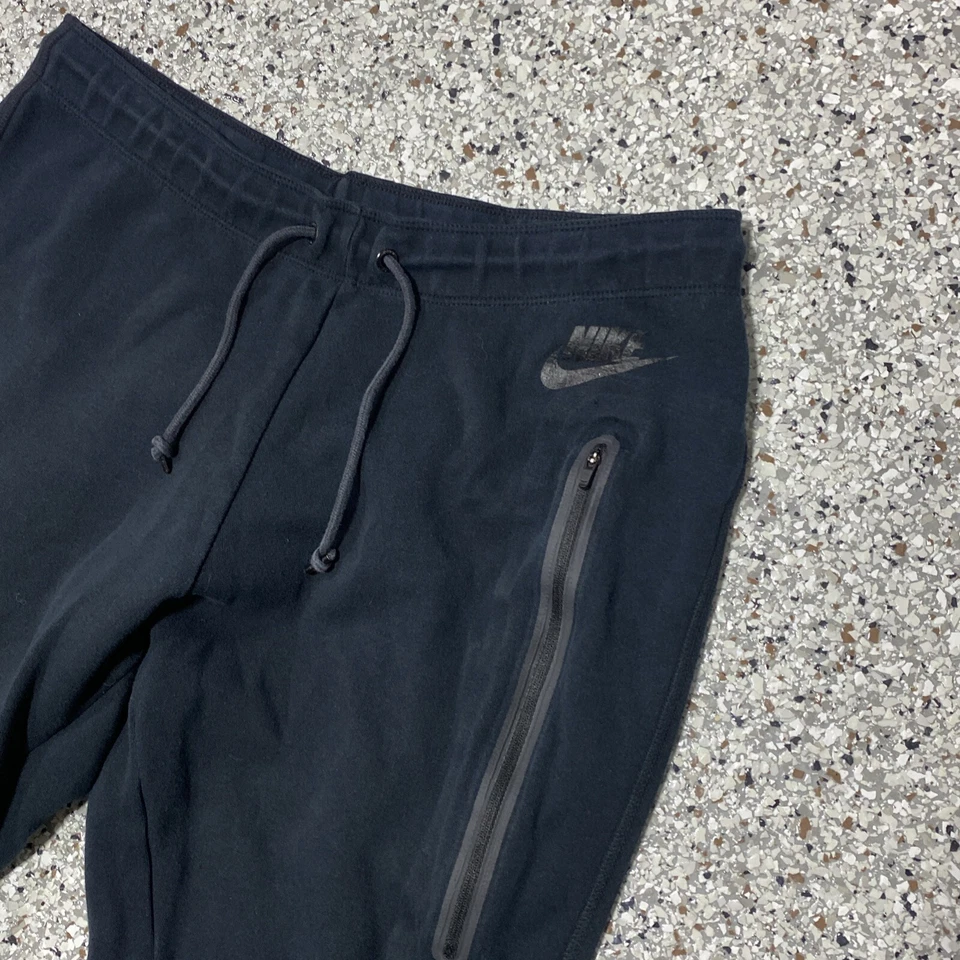 Pantalones de chándal Nike Sportswear para hombre medianos negros tecnológicos de vellón talla L Foto 2 de 4