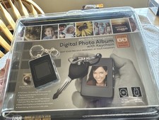 8Mb/USB Rechargeable Digital Photo Album w/ Key Chain 2007 Stores 60 Images