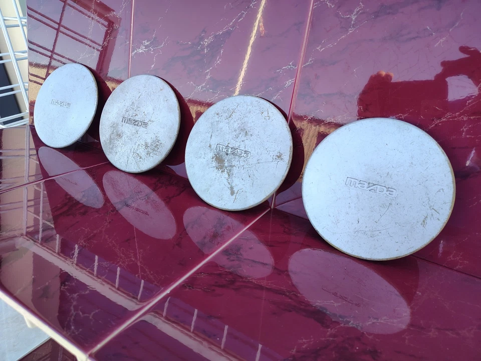 1990 - 1995 年马自达 323 Protege 626 车轮中心盖套装 (4) 原始设备制造商 # B457-7502 — 第 2/4 张图片