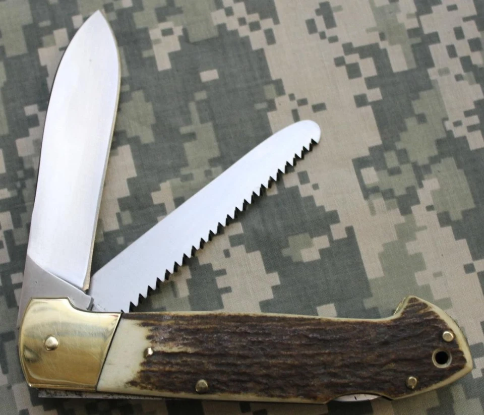 Cuchillo plegable Puma Jata 240 G lanza y hojas de sierra 212411 2010 Ultimate Hunting Foto 2 de 3