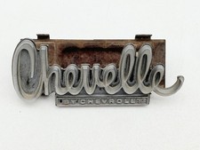 1974 Chevelle By Chevrolet Grille Badge Emblem Script Oem Backer Hardware 1974 Chevelle By Chevrolet Grille Badge Emblem Script Oem Backer Hardware
