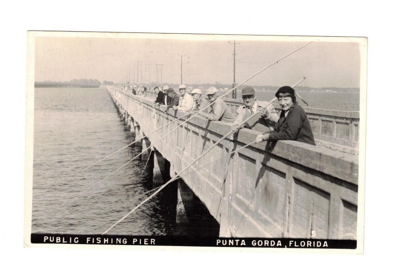 1956 RPPC Well Dressed Visitors Fishing on Charlotte Harbor Pier PUNTA