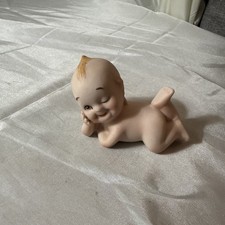 Lefton KW913 Kewpie Baby Blue Wings Ceramic Bisque Laying on Stomach