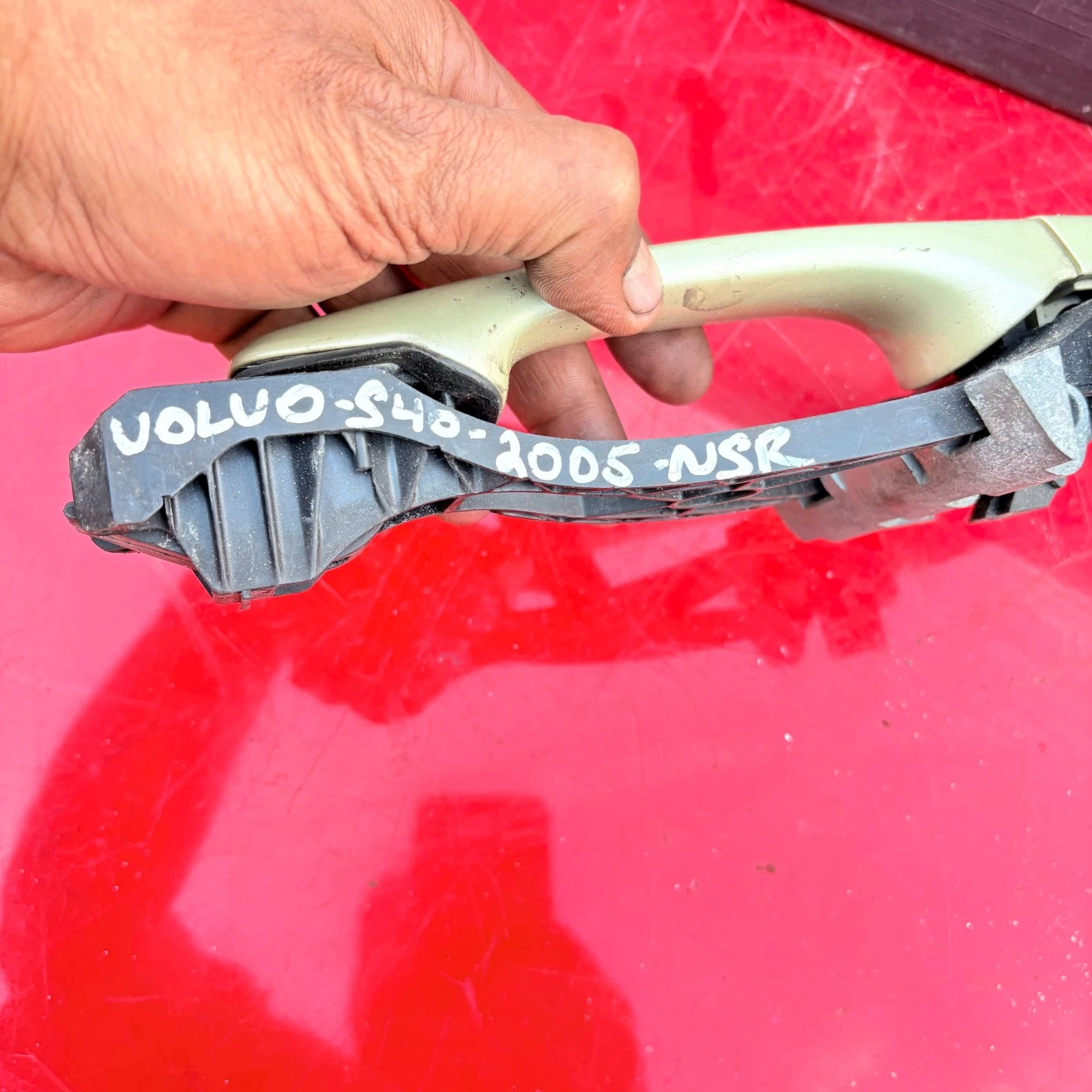 Actual Volvo S40 2005 NSR marking on rear left door handle