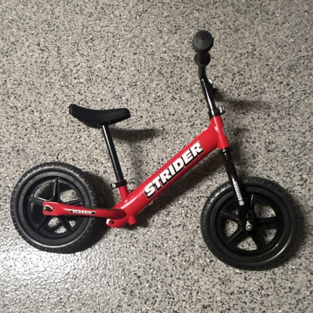 Strider 12 Classic Balance Bike Red Adjustable Seat Solid Rubber
