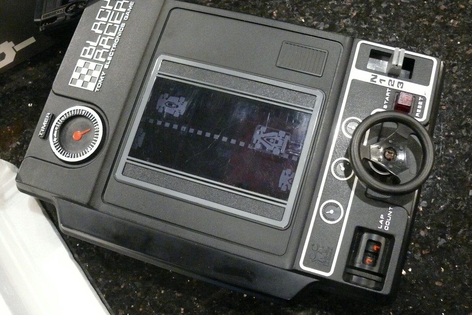 Vintage TOMY BLACK RACER Electronic Handheld tabletop arcade video game