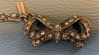 Coach Tea Rose Bow Puzzle Charm Fob Includes Dustbag
