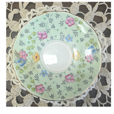 EB Foley Fine Bone China saucer with Foley Green Chinz pattern and gold trim.