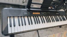 Casiotone CT-S100 Portable Electronic Piano Keyboard with adjustable stand.