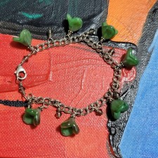 sterling silver chain links adorned with hand-collected green sea glass charms.