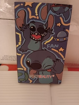Favor Beauty Eyeshadow Palette With Blue Creature On The Front