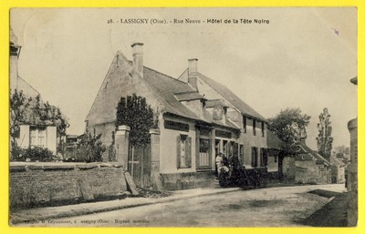 cpa LASSIGNY (Oise) Rue Neuve HOTEL de la TÊTE NOIR Schild ''Tête de Nègre''