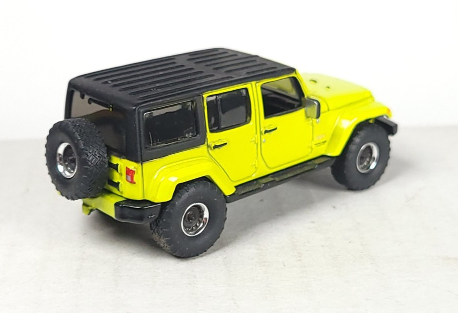 Auto World loose 2017 Jeep Wrangler Sahara Unlimited hyper green thumbnail 2