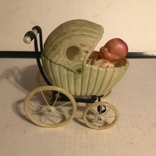 Vintage Baby Carriage with Baby Toy
