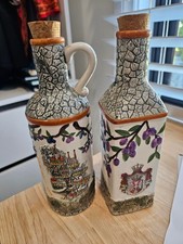 Serbian cruet oil and vinegar bottles with raised maps
