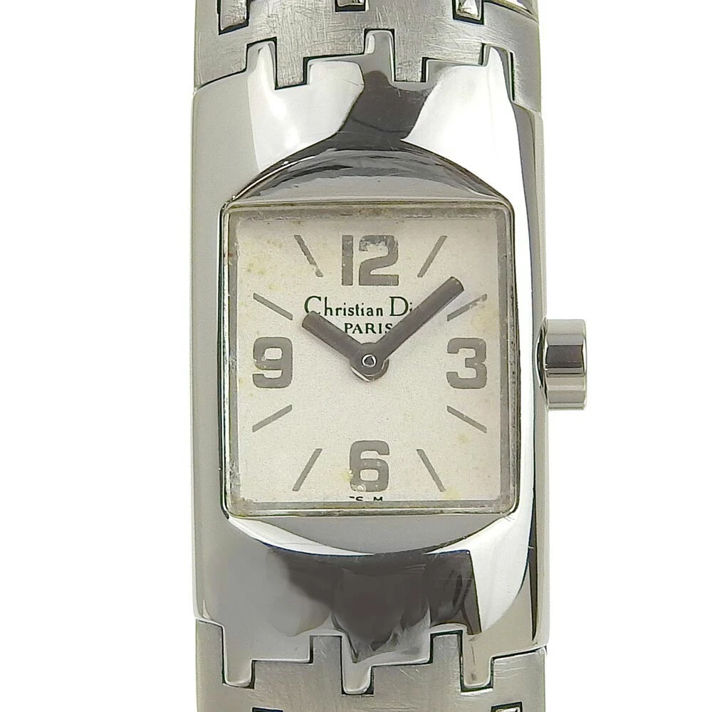 Montre Dior Diorfilique B   Occasion, boîtier rayé, cadran corrodé, bracelet réglable