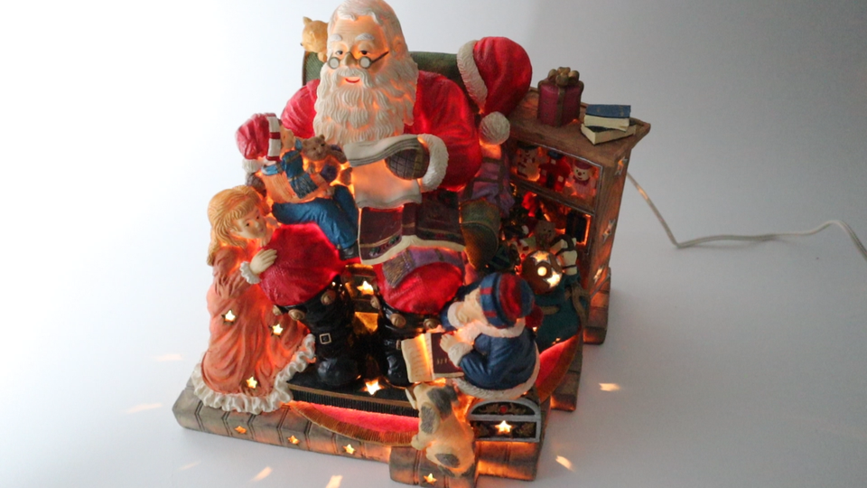 Grandeur Noel Santa Sitting Children Dog Cat &Toys Musical Illuminated