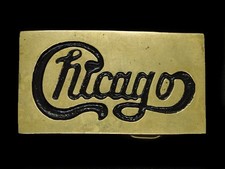 TJ13152 VINTAGE 1970s  CHICAGO  MUSIC BAND SOLID BRASS BARON BELT BUCKLE