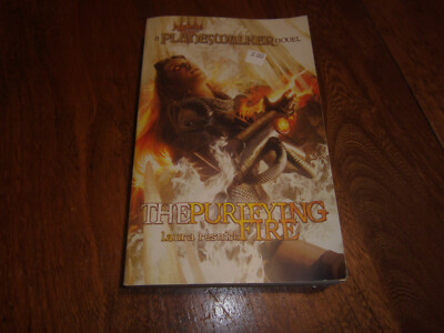 A Planeswalker Novel Ser.: The Purifying Fire by Laura Resnick (2009) Paperback