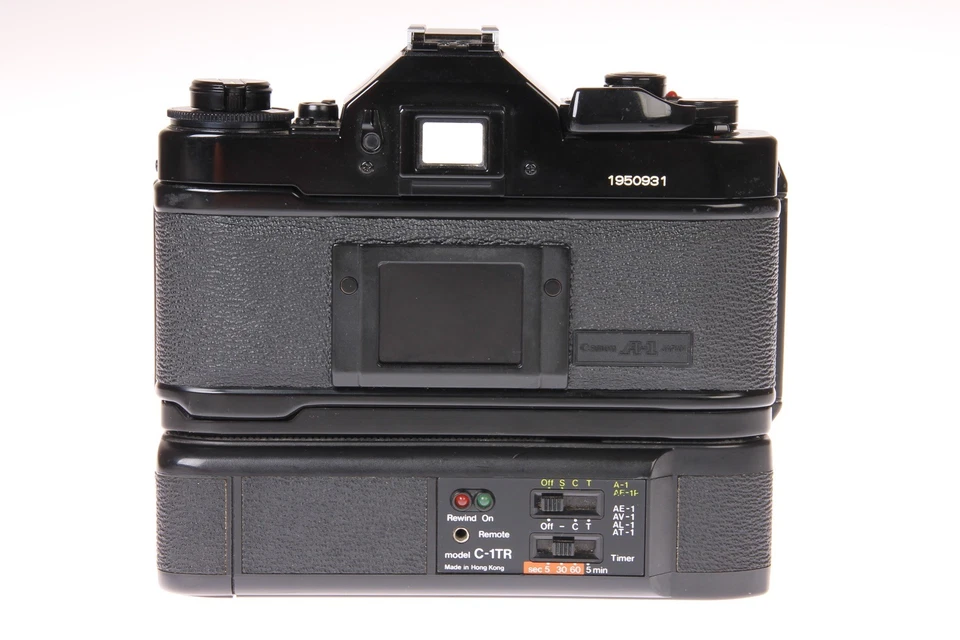 Cuerpo de cámara Canon A-1 SLR negro con lente 50 mm f1,4 FD y bobinadora eléctrica Jessop C-1TR Foto 4 de 4