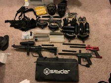 Two Tippman, 1 Spyder and 1 Avenger paintball guns plus 2 masks and gear.
