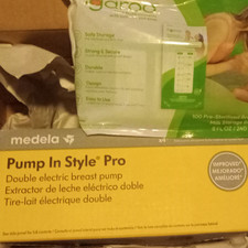 Medela Pump In Style Pro Double Electric Breast Pump w/ AC Adapter Bottles