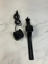 Fitbit Versa 1st Gen Smart Watch w/ Charging Cradle and black band Large