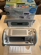 Cricut Create Electric Personal Cutting Machine CRV20001 Craft, & 5  Cartridges