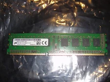 Micron PC3-12800U DDR3-1600 4GB UDIMM memory module for desktop PCs.