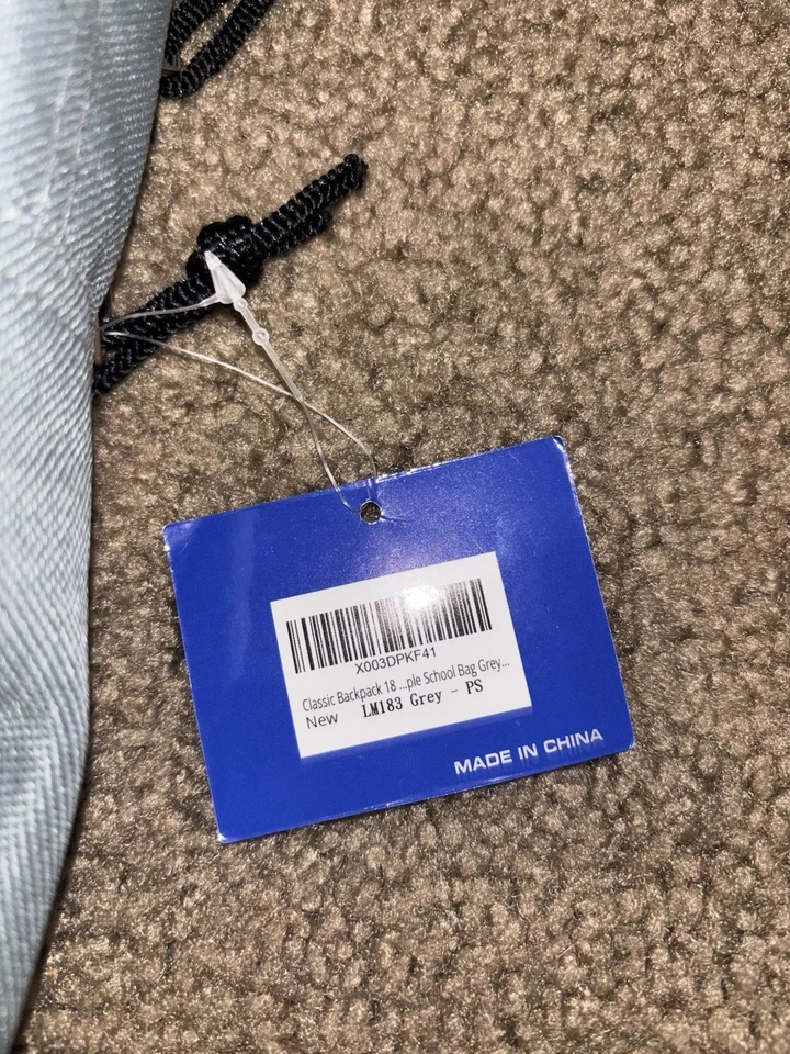 Mochila de nailon gris con detalles negros Foto 4 de 4